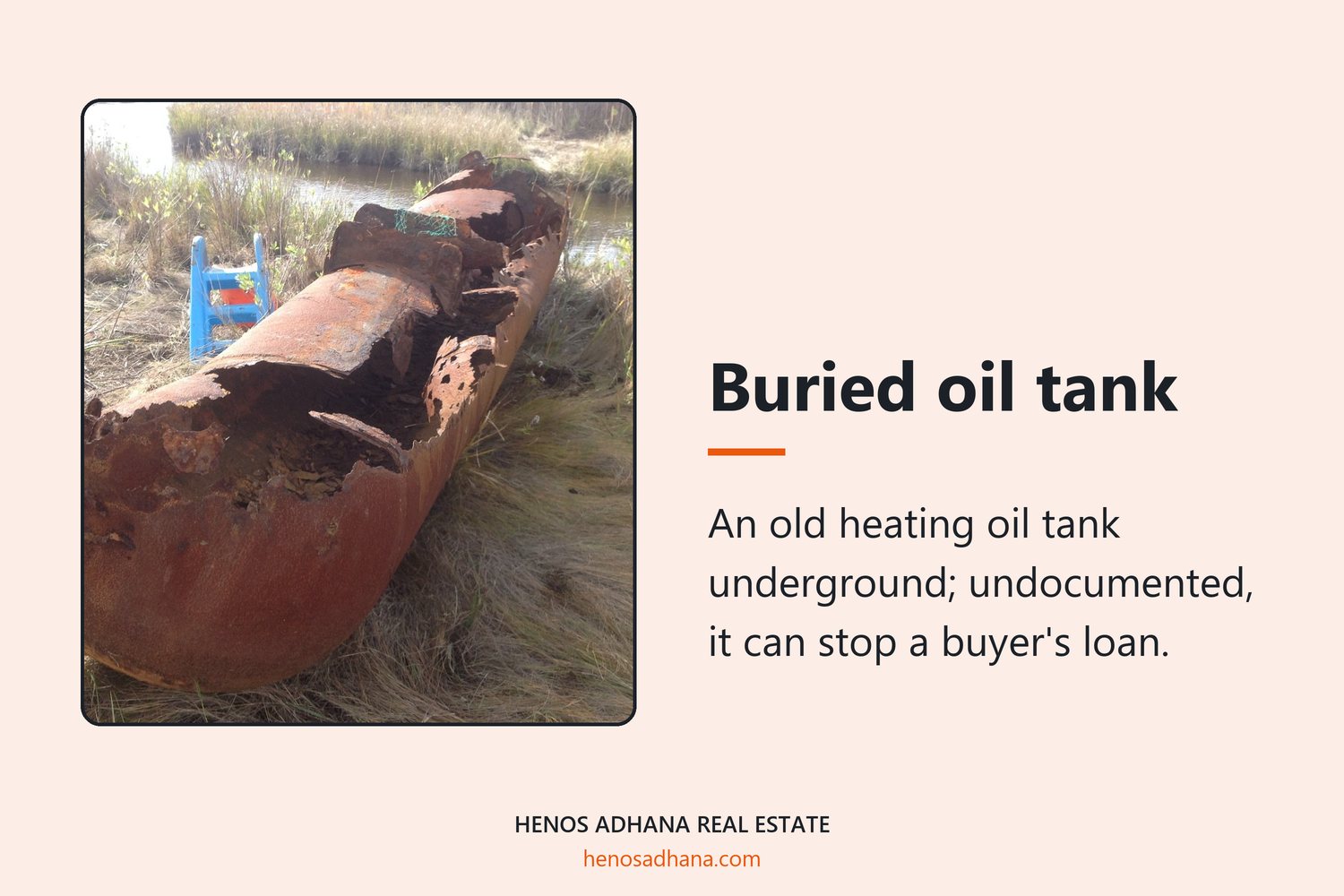 Buried oil tank: An old heating oil tank underground; undocumented, it can stop a buyer's loan. A photograph of a corroded steel oil tank after removal from the ground, rusted through in places.